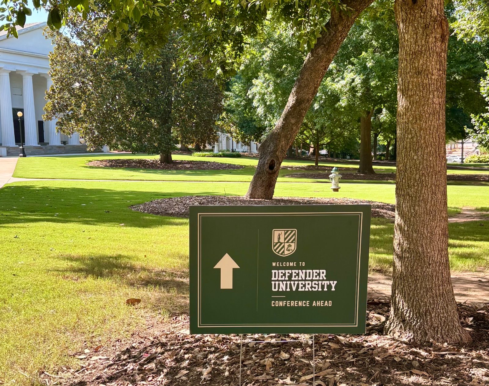 Welcome to Defender University sign at the GPDC Summer Public Defense Conference